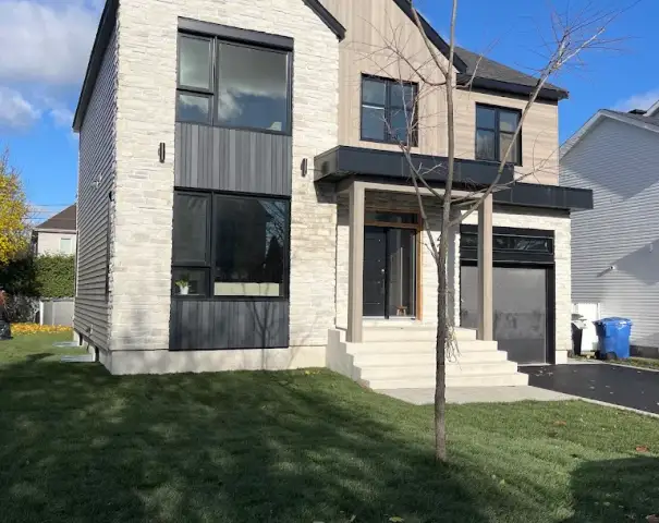 Maison neuve à deux étages en pierre et bois
